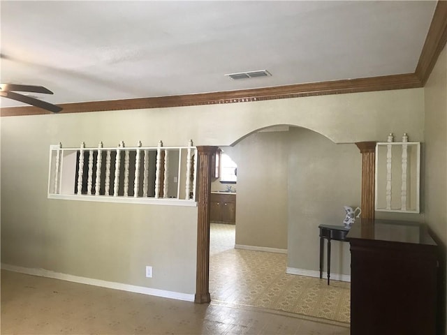 unfurnished room featuring crown molding and ceiling fan