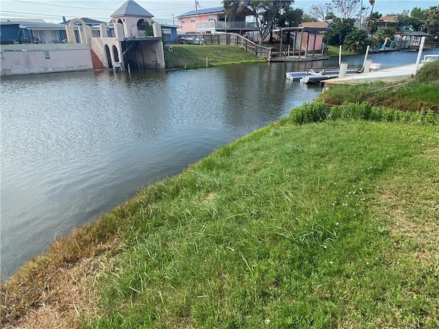 water view featuring a dock