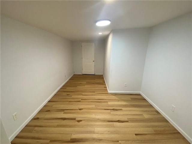 interior space with recessed lighting, baseboards, and light wood-type flooring