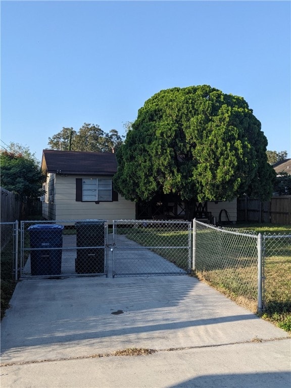 bungalow with a front yard