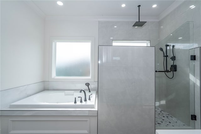 full bath featuring a garden tub, recessed lighting, a tile shower, and crown molding