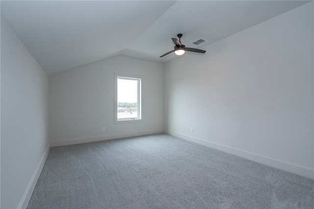 bonus room featuring light carpet, baseboards, visible vents, a ceiling fan, and lofted ceiling