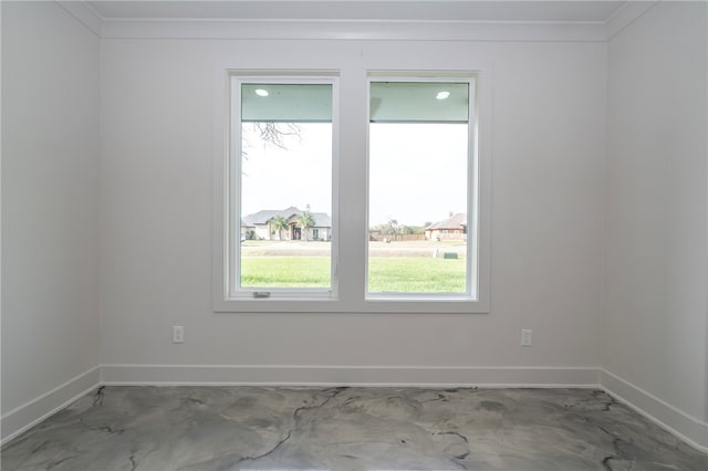 unfurnished room featuring ornamental molding