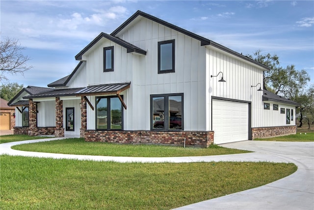 modern farmhouse style home with driveway, a standing seam roof, a front lawn, board and batten siding, and brick siding