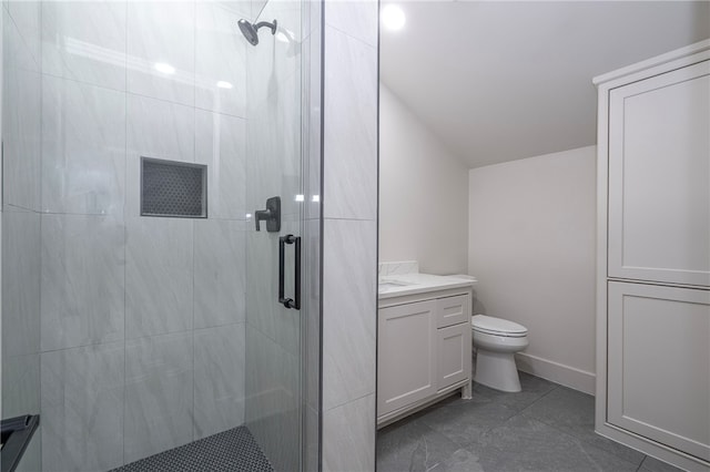 bathroom featuring vanity, vaulted ceiling, tile patterned flooring, toilet, and an enclosed shower