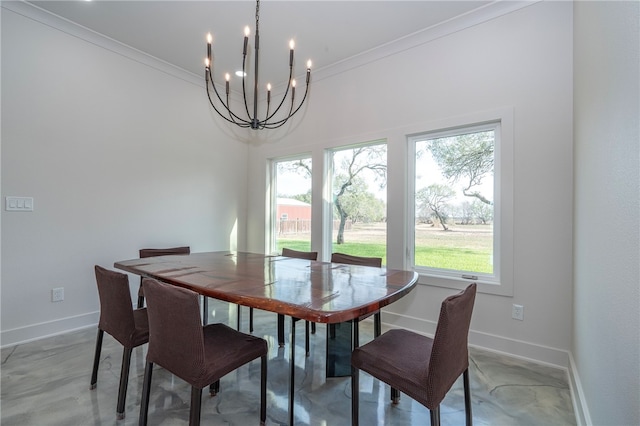 dining area with a chandelier and ornamental molding