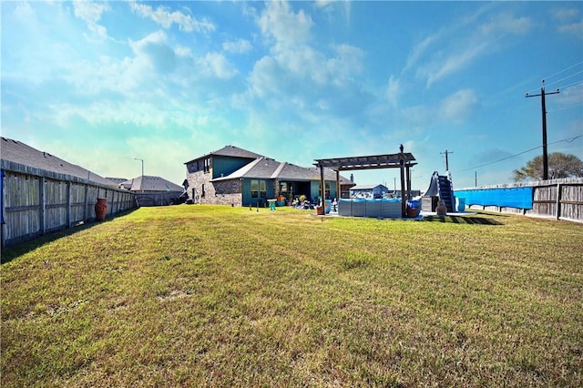 view of yard featuring a fenced backyard and a pergola