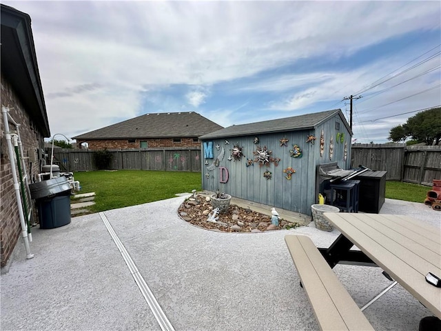 8218 Barlovento St, Corpus Christi, TX 78414 - view of patio / terrace featuring an outbuilding