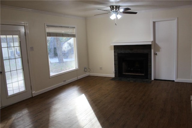 unfurnished living room with crown molding, ceiling fan, and dark hardwood / wood-style flooring