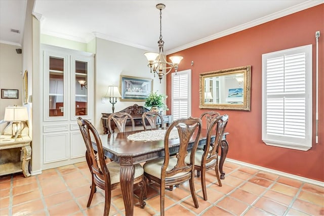 13530 Royal Fifth Ct, Corpus Christi, TX 78418 - dining area with a chandelier and ornamental molding