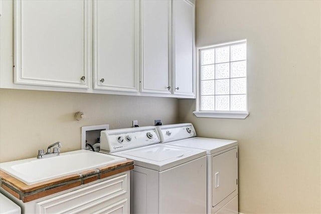 13530 Royal Fifth Ct, Corpus Christi, TX 78418 - clothes washing area with independent washer and dryer and cabinet space