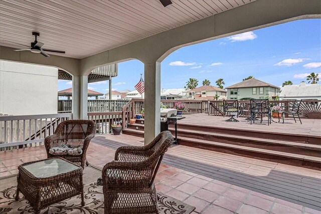 13530 Royal Fifth Ct, Corpus Christi, TX 78418 - wooden terrace featuring a patio, a ceiling fan, and grilling area