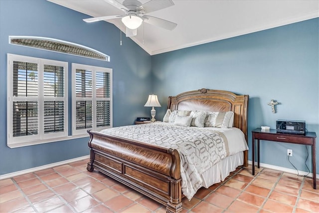 13530 Royal Fifth Ct, Corpus Christi, TX 78418 - bedroom with vaulted ceiling, baseboards, ceiling fan, and tile patterned flooring