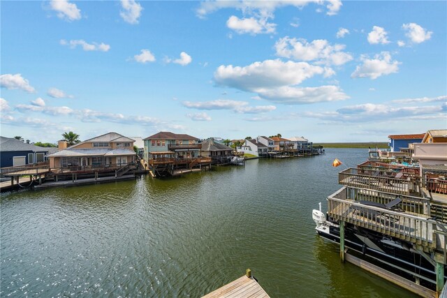 dock area featuring a water view