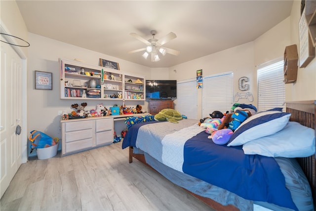 bedroom featuring light hardwood / wood-style flooring and ceiling fan