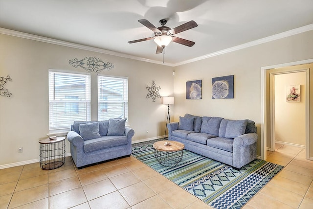 living room with ceiling fan, ornamental molding, and tile patterned floors