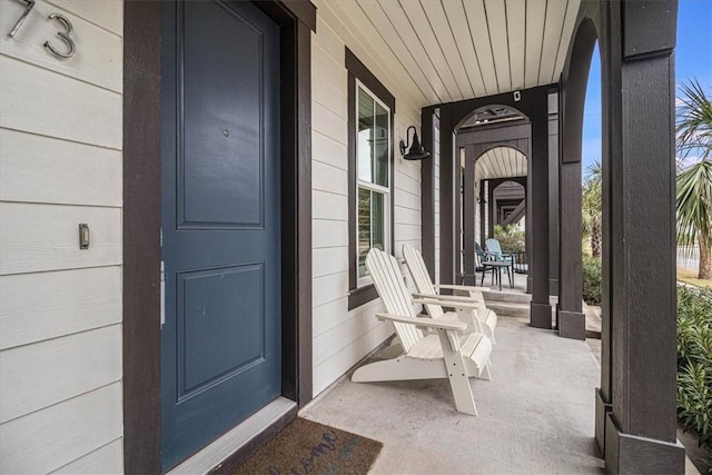 doorway to property featuring covered porch