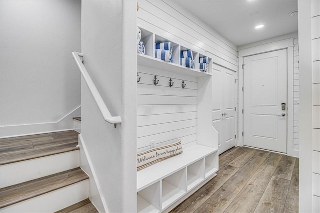 mudroom featuring baseboards, wood finished floors, and recessed lighting