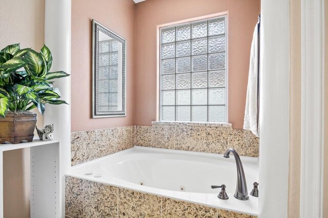 122 Bay Ct, Aransas Pass, TX 78336 - bathroom featuring a whirlpool tub