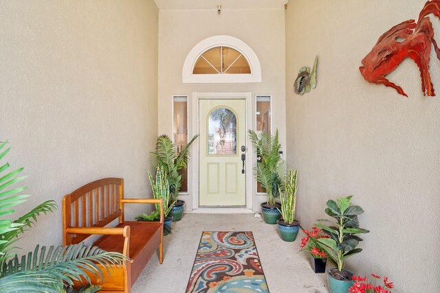 122 Bay Ct, Aransas Pass, TX 78336 - doorway to property with stucco siding