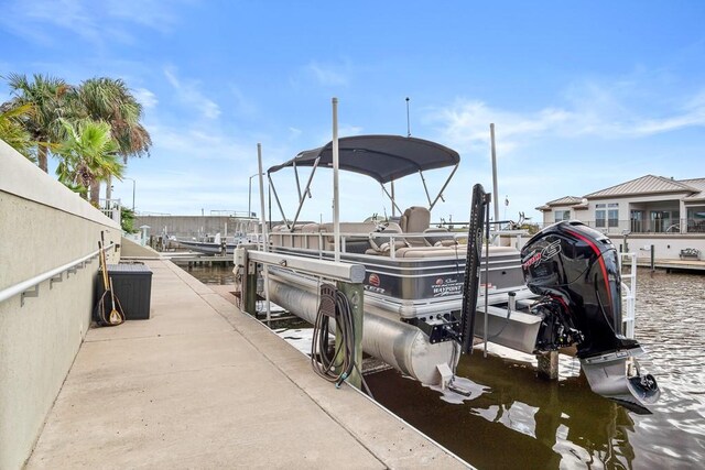 122 Bay Ct, Aransas Pass, TX 78336 - dock area with boat lift and a water view