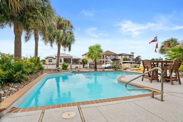 122 Bay Ct, Aransas Pass, TX 78336 - swimming pool with a patio area