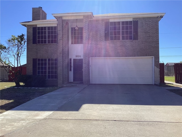 view of front of property featuring a garage