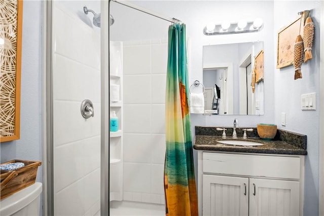 678 Anchor Dr, Port Aransas, TX 78373 - bathroom featuring a stall shower, toilet, and vanity