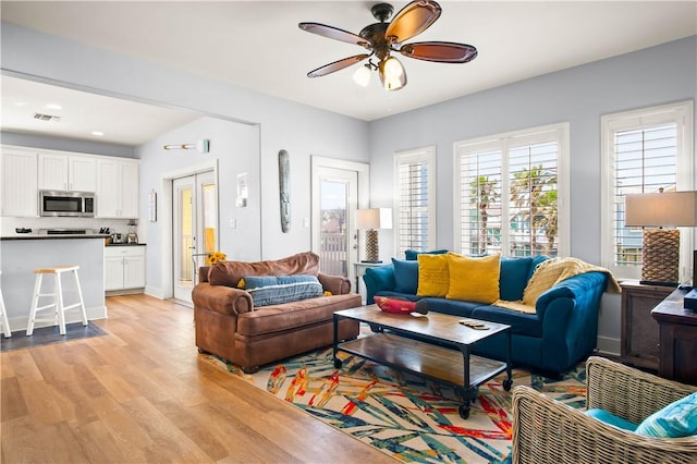 678 Anchor Dr, Port Aransas, TX 78373 - living room featuring light wood-type flooring and ceiling fan