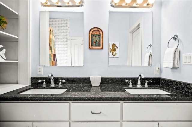 678 Anchor Dr, Port Aransas, TX 78373 - full bathroom with double vanity