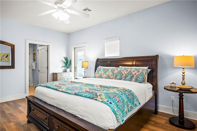 678 Anchor Dr, Port Aransas, TX 78373 - bedroom with baseboards, wood finished floors, and a ceiling fan