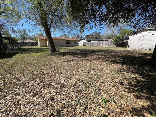 view of yard with fence