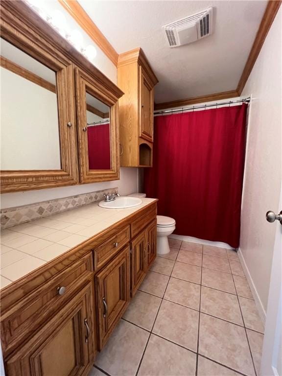 full bath featuring visible vents, crown molding, toilet, tile patterned floors, and vanity