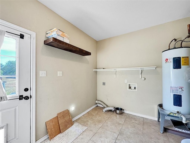 laundry area with electric dryer hookup, water heater, light tile patterned flooring, and washer hookup