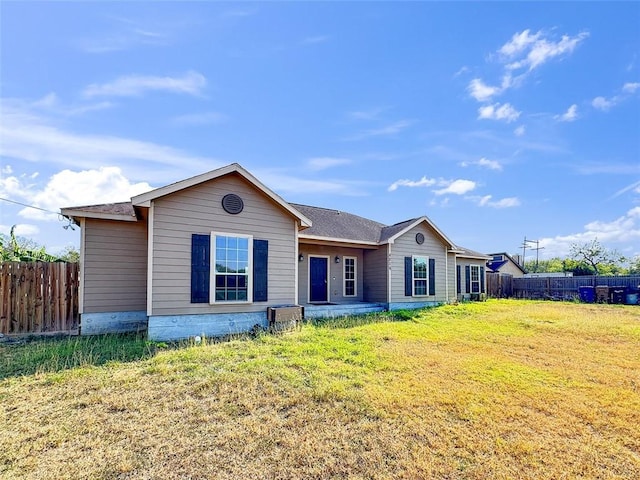 ranch-style house featuring a front lawn