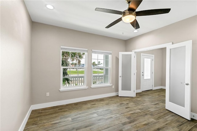 110 Keewaydin Ln, Port Aransas, TX 78373 - entryway featuring ceiling fan, wood finished floors, french doors, and recessed lighting
