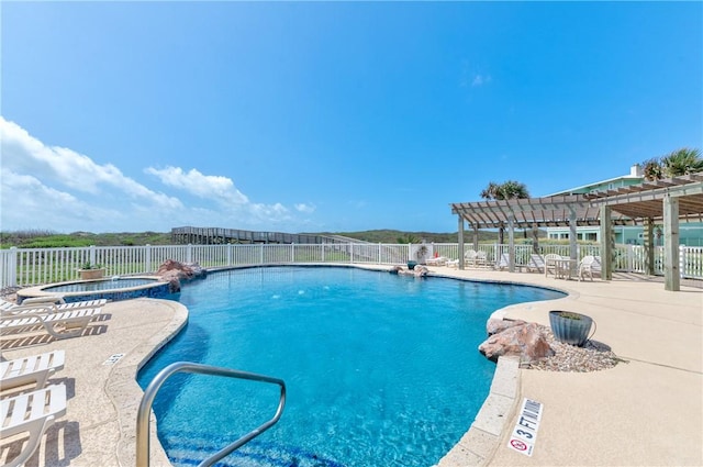 110 Keewaydin Ln, Port Aransas, TX 78373 - view of pool featuring a pergola, a patio area, and a pool with connected hot tub