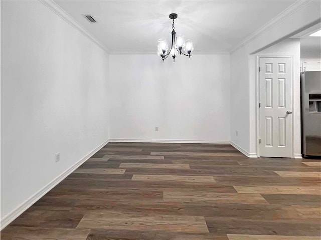 unfurnished dining area with a notable chandelier, dark hardwood / wood-style flooring, and ornamental molding