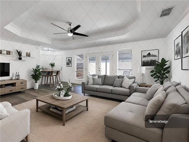 living room with hardwood / wood-style flooring and ceiling fan