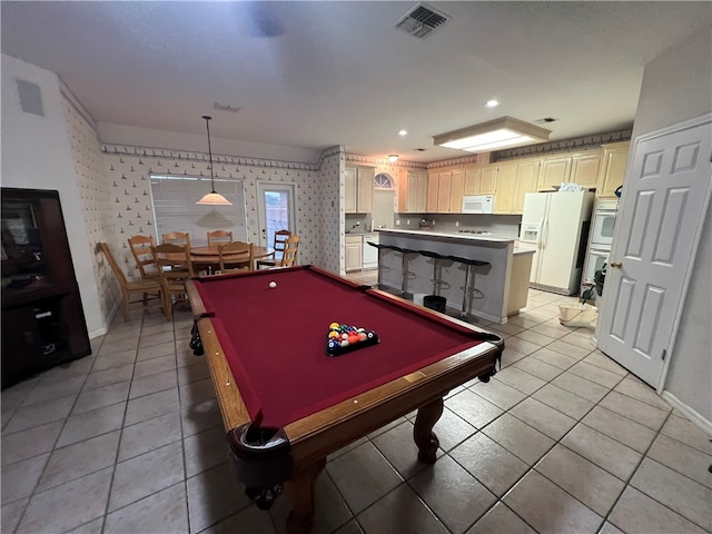 recreation room with pool table and light tile patterned floors