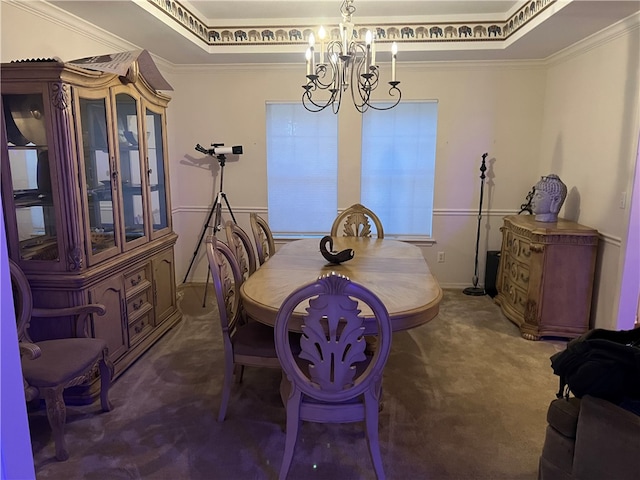 carpeted dining space with a tray ceiling, a notable chandelier, and ornamental molding