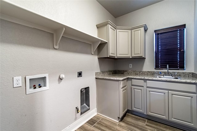 8022 Calgary Dr, Corpus Christi, TX 78414 - washroom with hookup for a gas dryer, washer hookup, hookup for an electric dryer, and dark wood finished floors