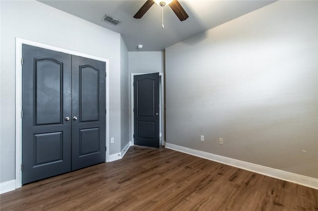 8022 Calgary Dr, Corpus Christi, TX 78414 - unfurnished bedroom with wood finished floors, a closet, and ceiling fan