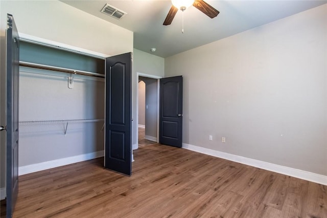 8022 Calgary Dr, Corpus Christi, TX 78414 - unfurnished bedroom featuring wood finished floors, a closet, and ceiling fan