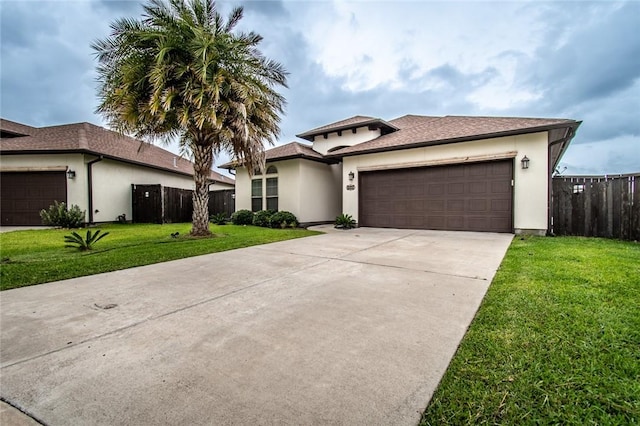 8022 Calgary Dr, Corpus Christi, TX 78414 - prairie-style home featuring concrete driveway, a garage, and stucco siding