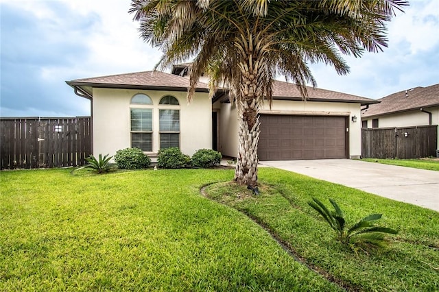 8022 Calgary Dr, Corpus Christi, TX 78414 - view of front facade with stucco siding, driveway, and an attached garage