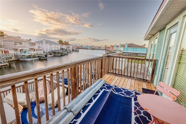 deck at dusk with a water view