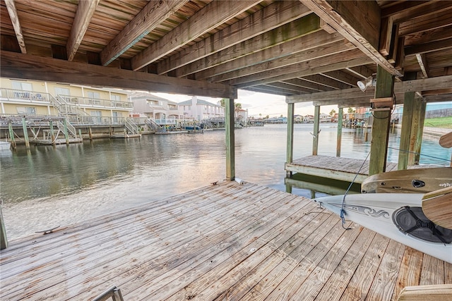 view of dock with a water view