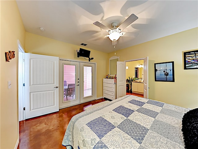 bedroom featuring access to exterior, french doors, ceiling fan, and connected bathroom