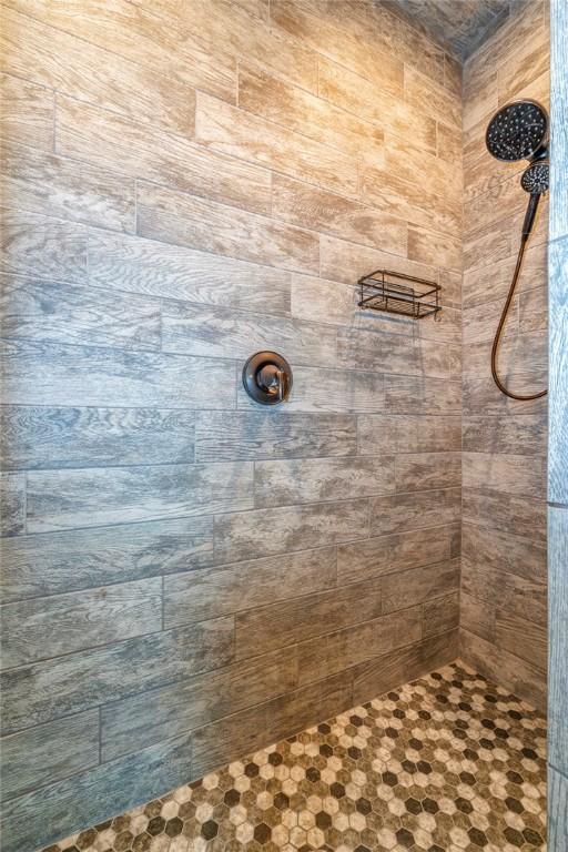 4609 Tuscan Way, Corpus Christi, TX 78410 - bathroom with tiled shower